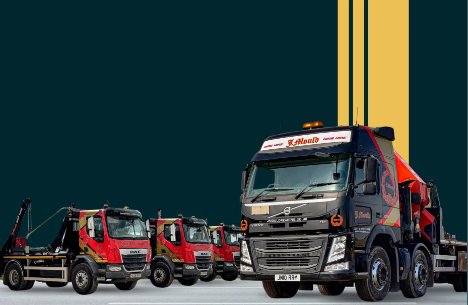 Fleet of J Mould tipper and crane lorries against a dark teal backdrop
