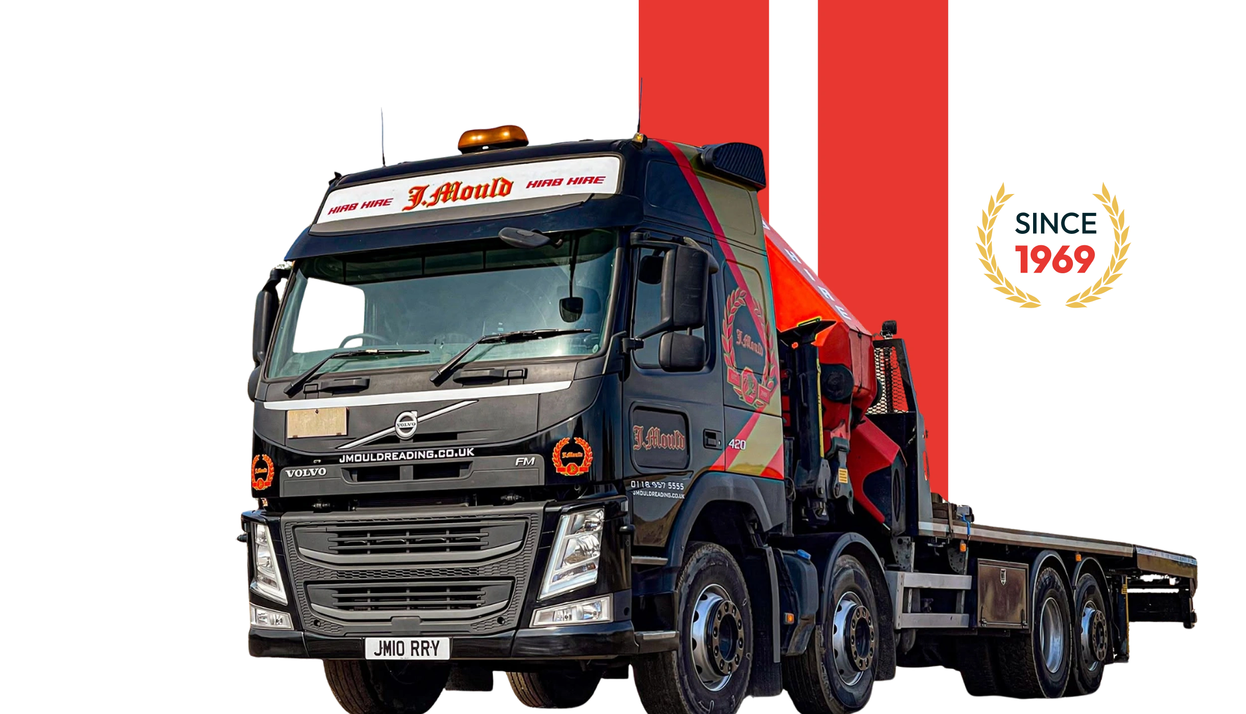 J Mould HIAB hire flatbed lorry with a Since 1969 badge