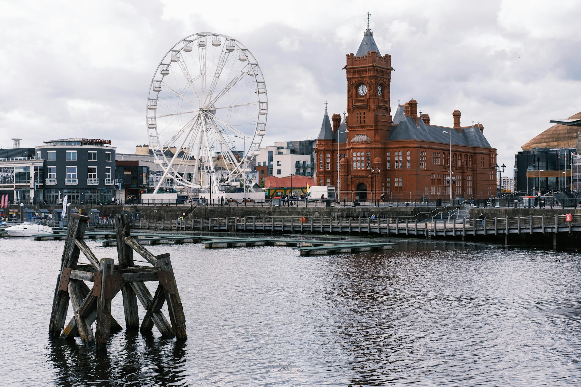 Cardiff Bay waterfront with the Pierhead Building and a big wheel, served by J Mould demolition