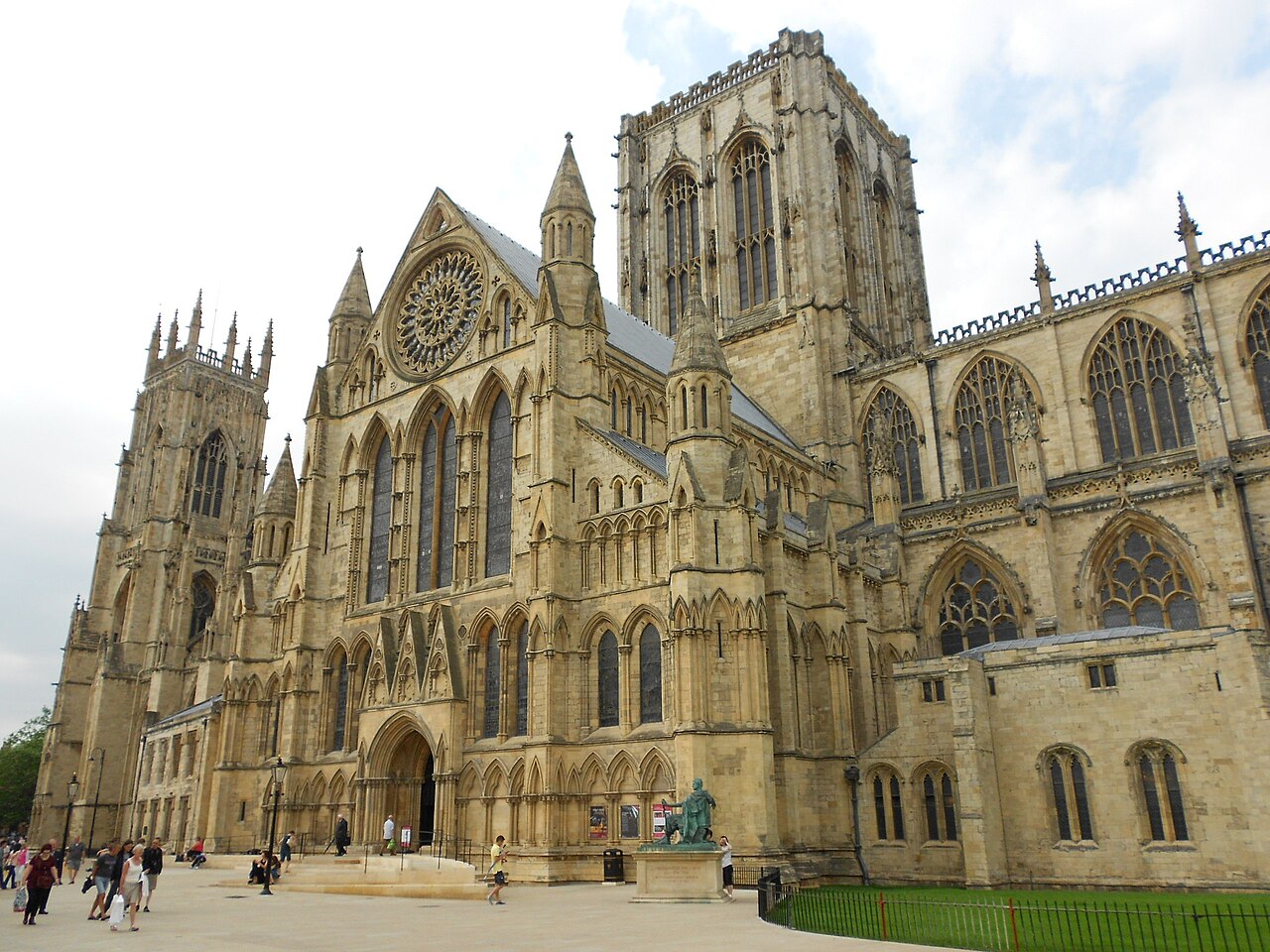 York Minster's south side with its rose window and central tower, where J Mould carries out demolition