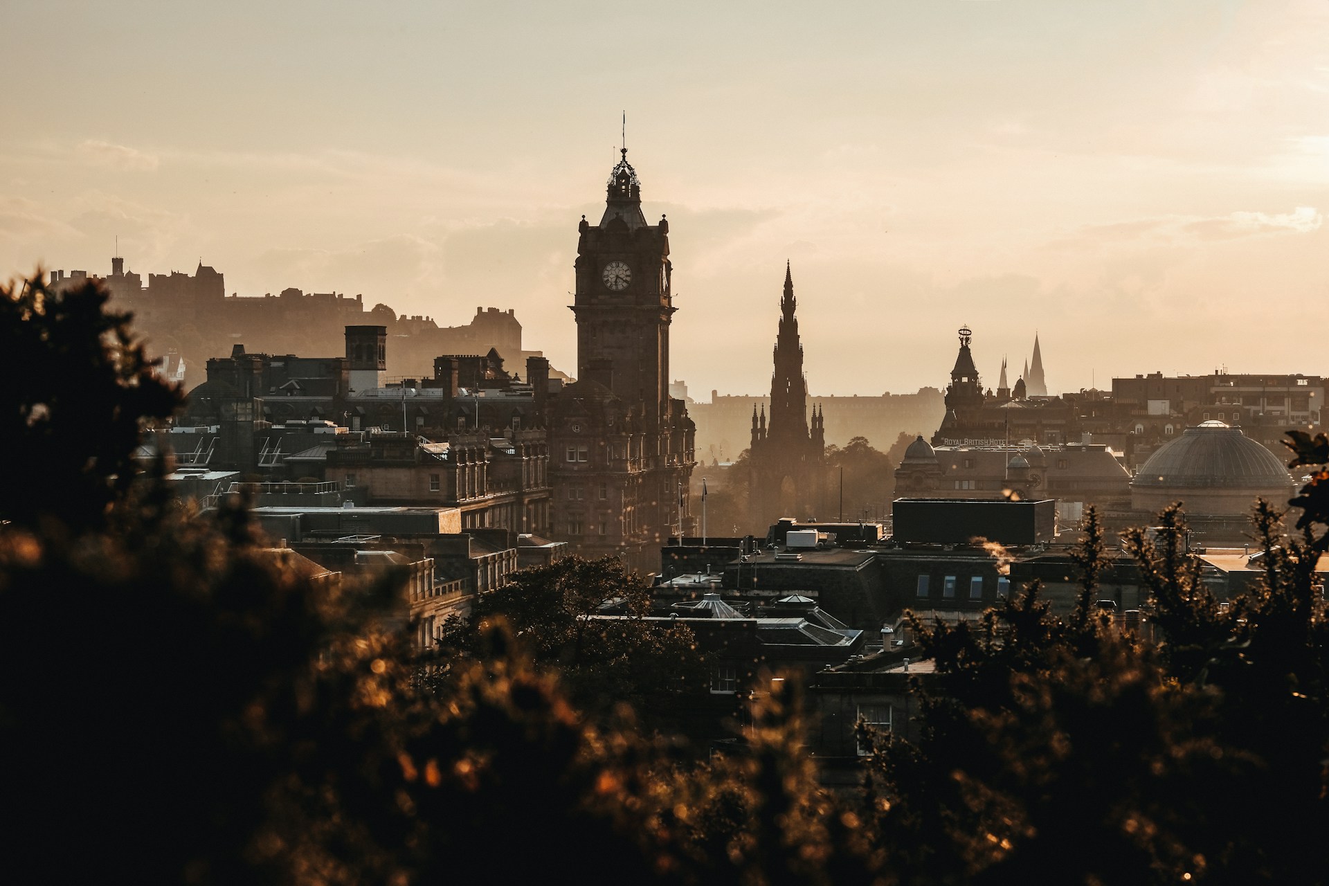 Edinburgh skyline at dusk with the Balmoral clock tower and the castle, served by J Mould demolition