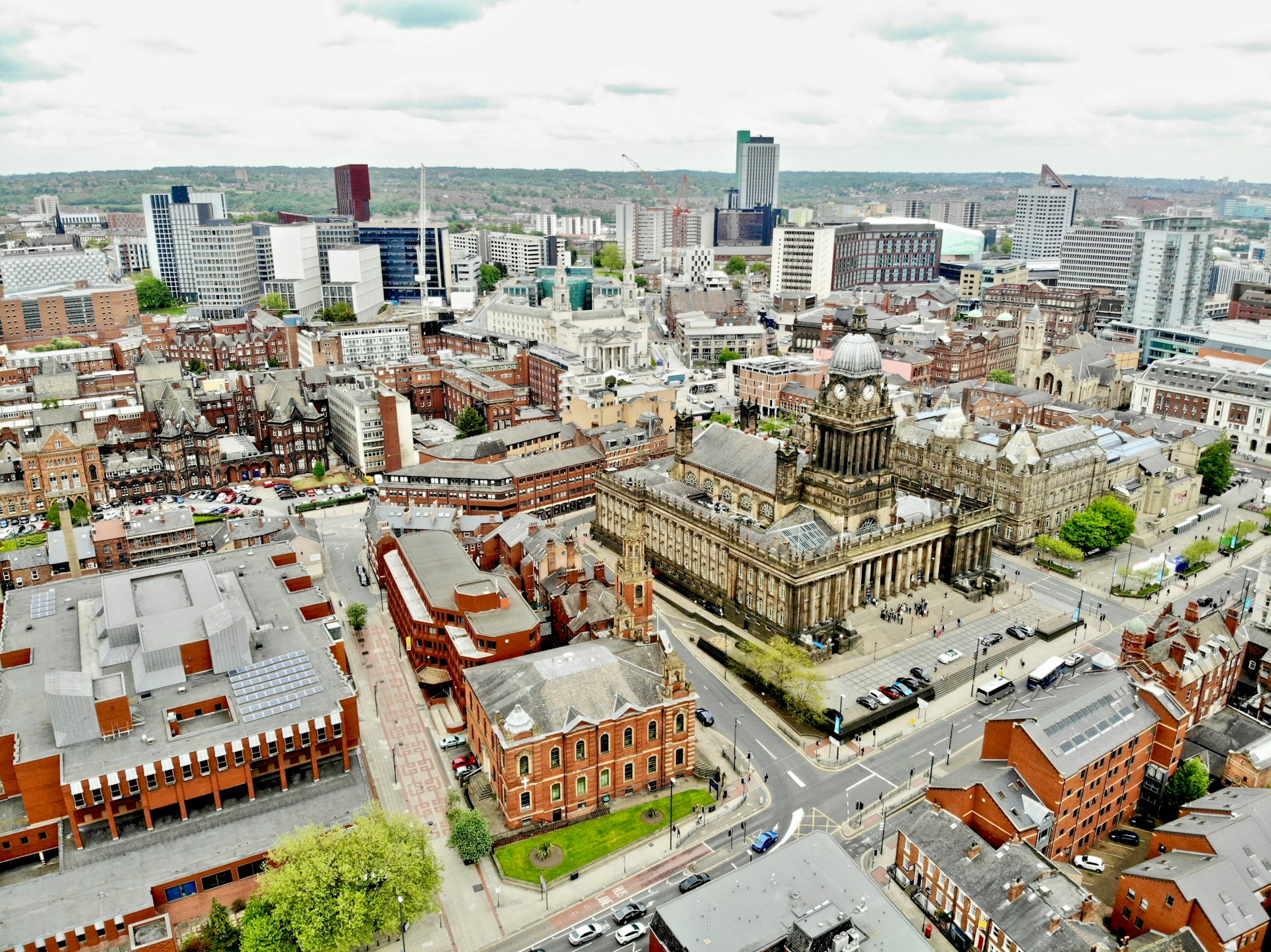 Aerial view of Leeds city centre around the Town Hall clock tower, where J Mould carries out demolition