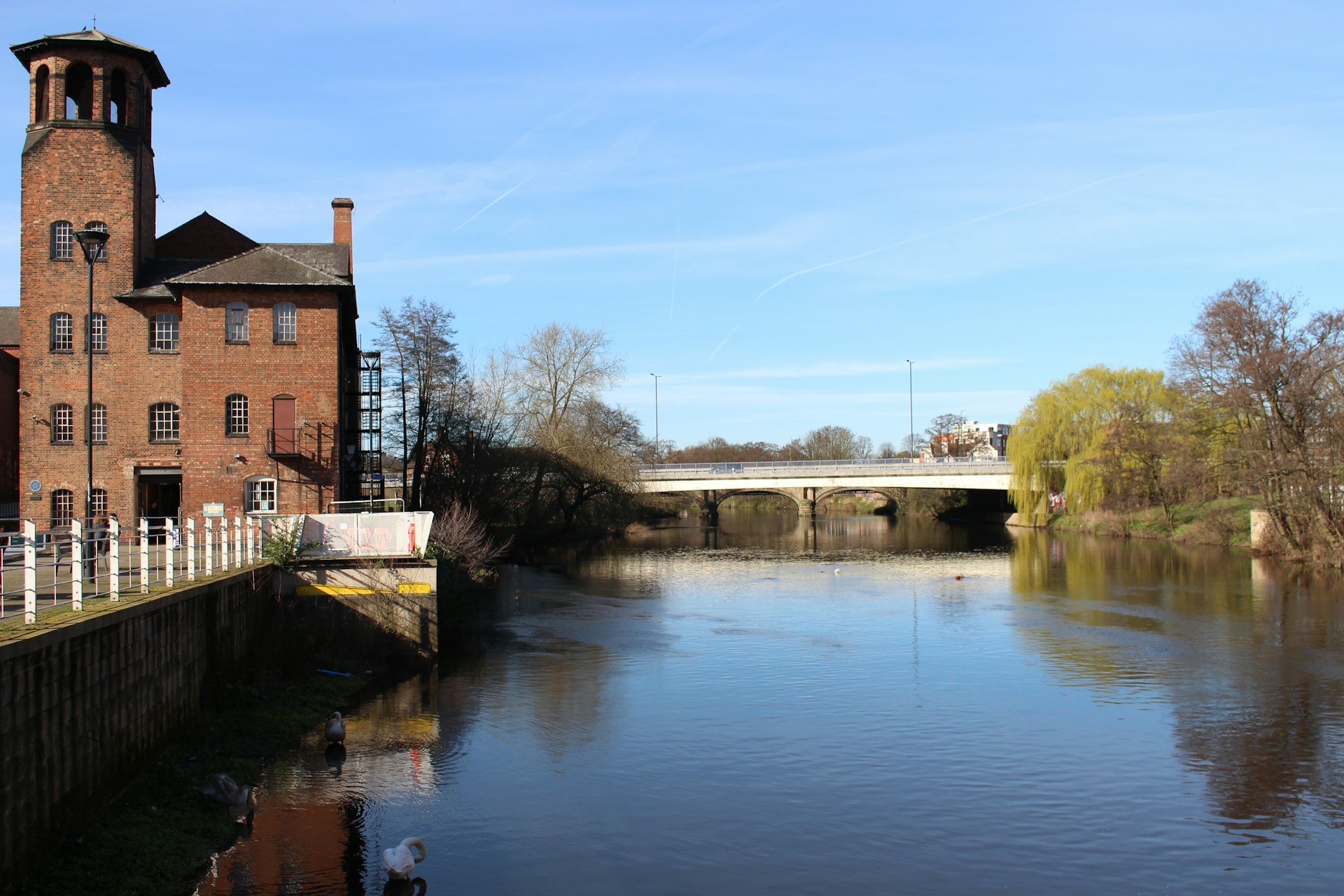 Derby Silk Mill's bell tower beside the River Derwent, a city J Mould covers for demolition