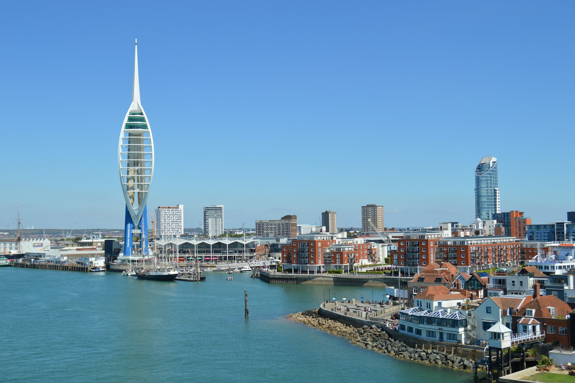 Spinnaker Tower and Gunwharf Quays across Portsmouth Harbour, where J Mould carries out demolition